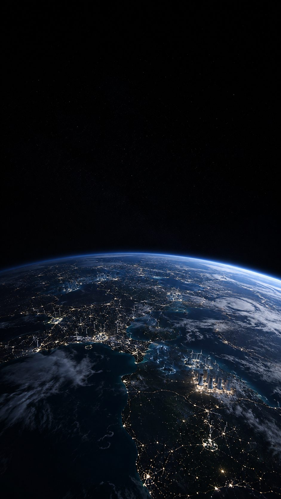 Earth at night, city lights visible from orbit